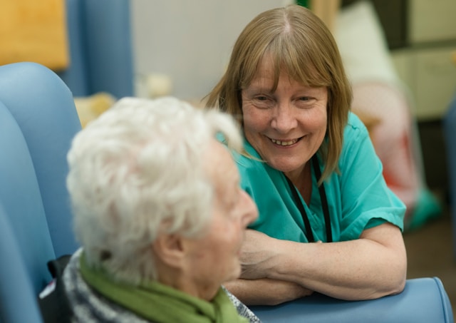Caregiver providing specialized cognitive and physical support